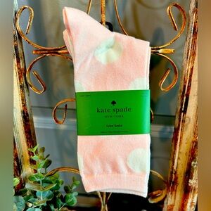 Kate Spade New York 3-pair set of pink and white polka dot crew socks.